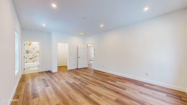 209 Bindale Rd, Tamiment, PA 18324 - unfurnished bedroom with light wood-type flooring, recessed lighting, ensuite bathroom, and baseboards
