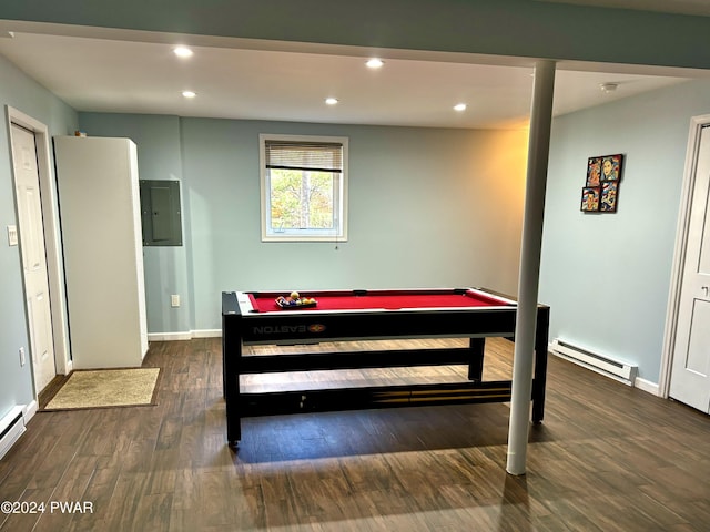 playroom featuring electric panel, dark hardwood / wood-style flooring, a baseboard heating unit, and billiards