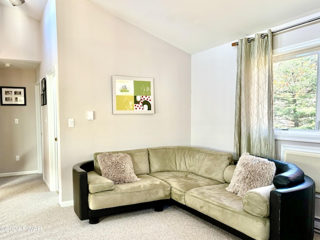 living room with light carpet and vaulted ceiling