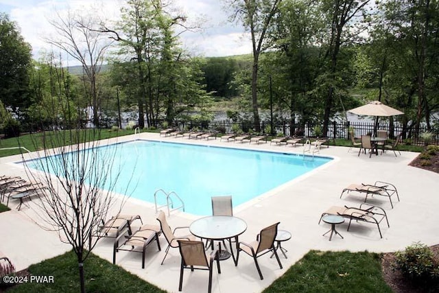 view of pool with a patio area