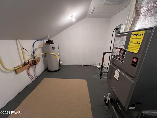 utility room featuring gas water heater and heating unit