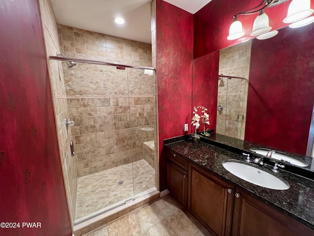 bathroom featuring vanity and walk in shower