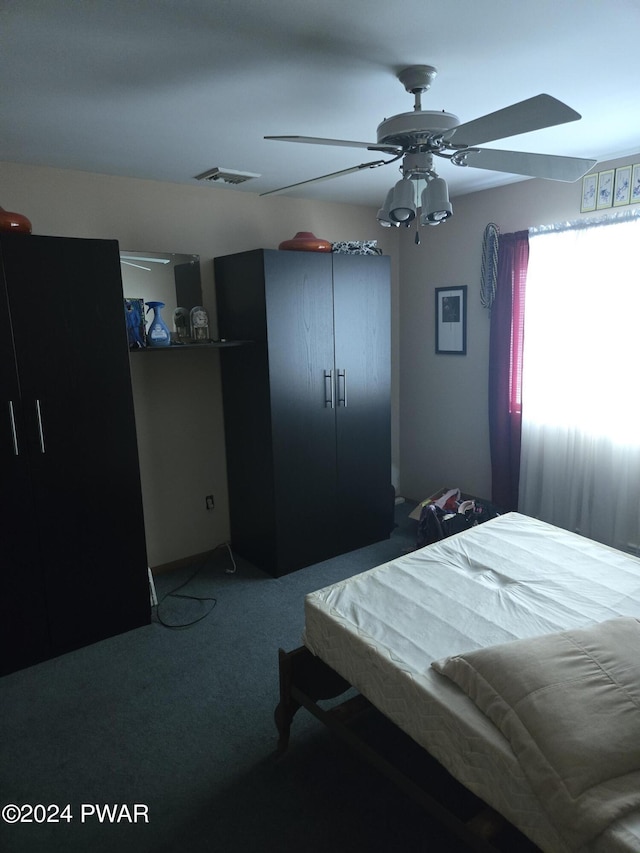 bedroom featuring carpet flooring and ceiling fan