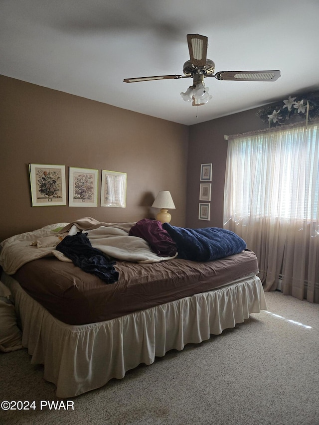 bedroom featuring carpet flooring and ceiling fan