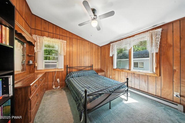 201 Oak Hill Rd, Hawley, PA 18428 - bedroom with vaulted ceiling, a baseboard heating unit, wood walls, carpet flooring, and cooling unit