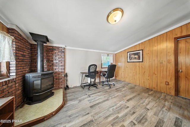 201 Oak Hill Rd, Hawley, PA 18428 - office space with a wood stove, wood finished floors, ornamental molding, and wood walls