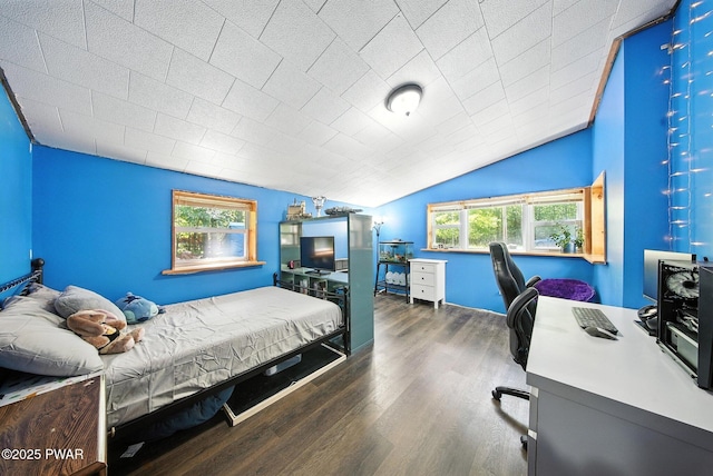 201 Oak Hill Rd, Hawley, PA 18428 - bedroom featuring vaulted ceiling, multiple windows, wood finished floors, and an office area