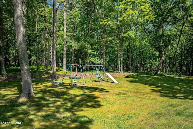 201 Oak Hill Rd, Hawley, PA 18428 - view of green lawn featuring a playground and a forest view