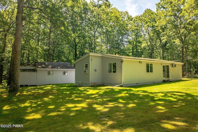 201 Oak Hill Rd, Hawley, PA 18428 - back of house with crawl space and a yard