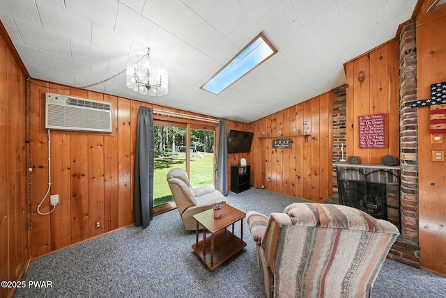 201 Oak Hill Rd, Hawley, PA 18428 - living area with carpet, a wall mounted air conditioner, wooden walls, vaulted ceiling, and a fireplace