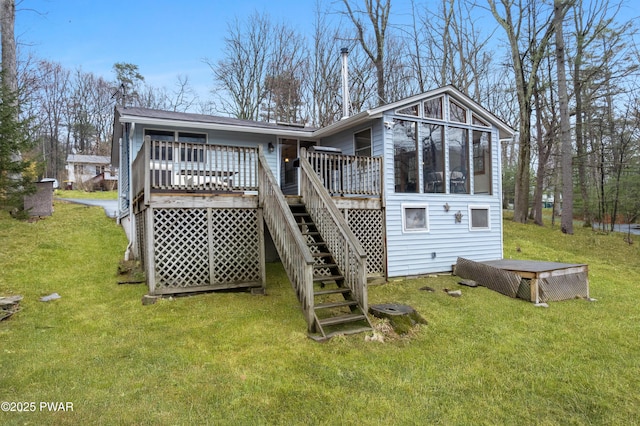 135 Outer Dr, Dingmans Ferry, PA 18328 - back of house featuring a wooden deck, a lawn, and stairs