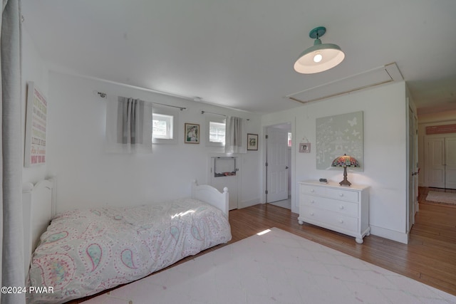 bedroom featuring light hardwood / wood-style floors