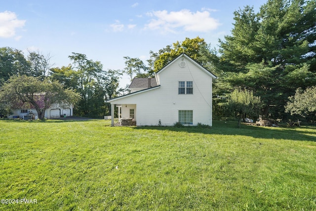 view of home's exterior featuring a lawn