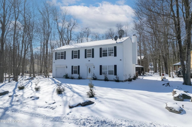 view of front of home with a garage