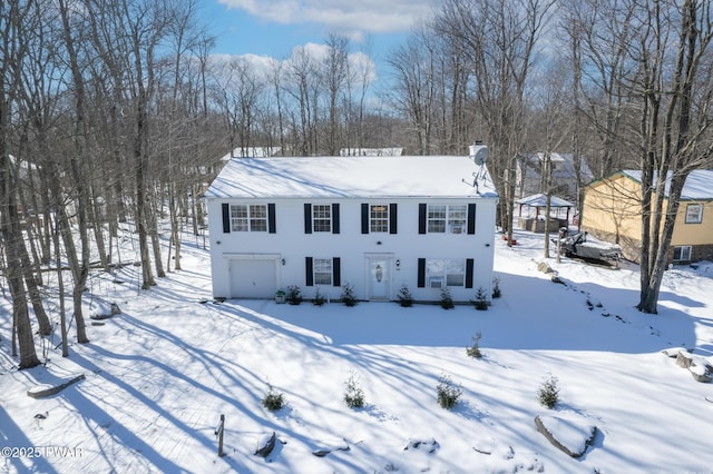 view of front of property featuring a garage