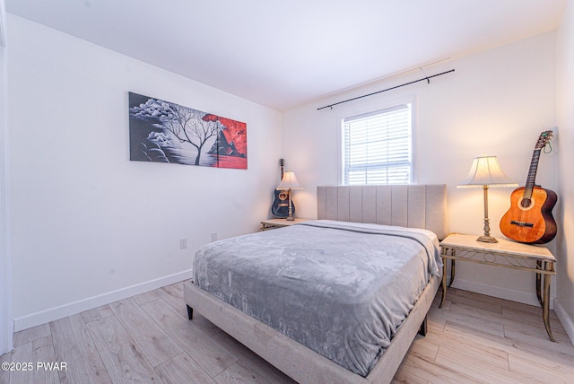 bedroom featuring light wood-type flooring