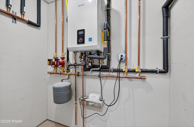 120 Milford Estates Dr, Milford, PA 18337 - utility room featuring tankless water heater