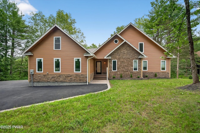 120 Milford Estates Dr, Milford, PA 18337 - rustic home featuring stone siding and a front lawn