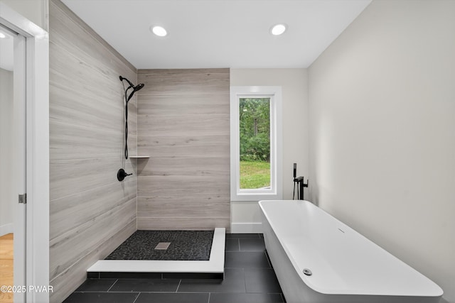 120 Milford Estates Dr, Milford, PA 18337 - full bath with tiled shower, tile patterned floors, a freestanding tub, and recessed lighting