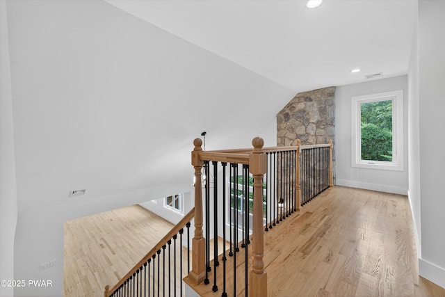 120 Milford Estates Dr, Milford, PA 18337 - hall with wood finished floors, an upstairs landing, vaulted ceiling, and recessed lighting