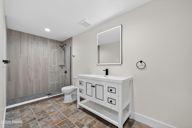 120 Milford Estates Dr, Milford, PA 18337 - bathroom featuring tiled shower, vanity, recessed lighting, and stone finish flooring