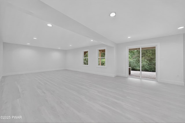 120 Milford Estates Dr, Milford, PA 18337 - unfurnished living room with recessed lighting and light wood-style floors
