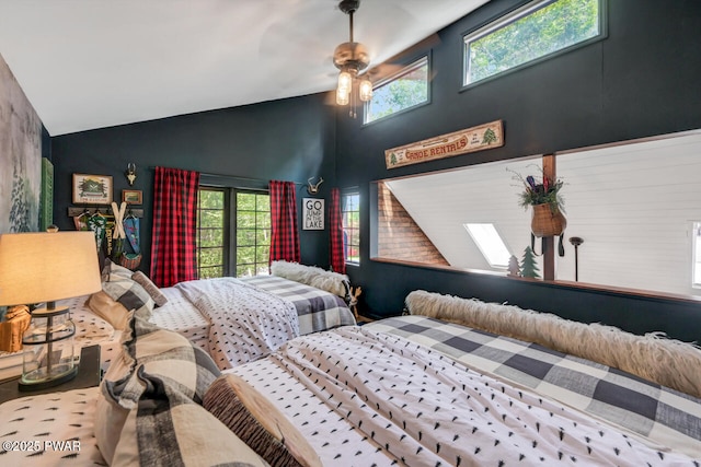 803 Deerfield Rd, Lake Ariel, PA 18436 - bedroom with high vaulted ceiling, a skylight, and a ceiling fan