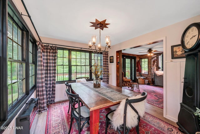 803 Deerfield Rd, Lake Ariel, PA 18436 - dining room with wood finished floors, healthy amount of natural light, and a chandelier