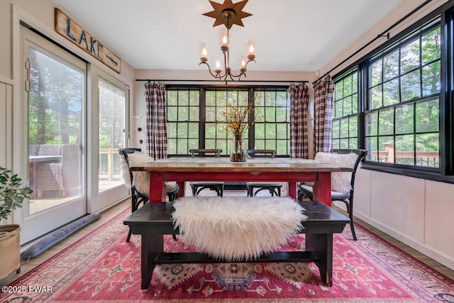 803 Deerfield Rd, Lake Ariel, PA 18436 - dining space featuring plenty of natural light, a chandelier, and wood finished floors