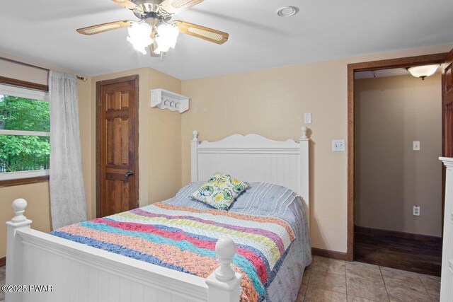 141 Constitution Dr, Lackawaxen, PA 18435 - bedroom with baseboards and a ceiling fan