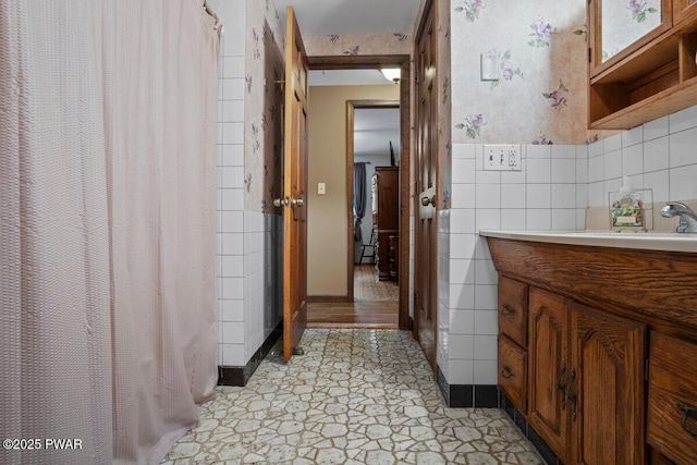141 Constitution Dr, Lackawaxen, PA 18435 - bathroom with vanity, tile walls, wallpapered walls, and a shower with curtain