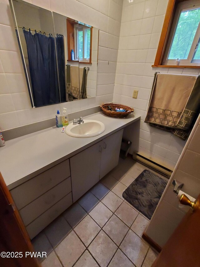 188 Forest Ridge Dr, Hawley, PA 18428 - full bathroom with plenty of natural light, vanity, tile walls, tile patterned floors, and a shower with curtain