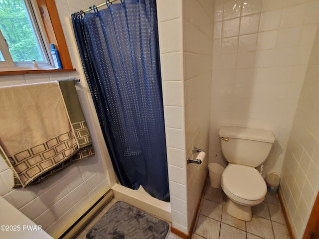188 Forest Ridge Dr, Hawley, PA 18428 - full bathroom with tile walls, a stall shower, and tile patterned flooring