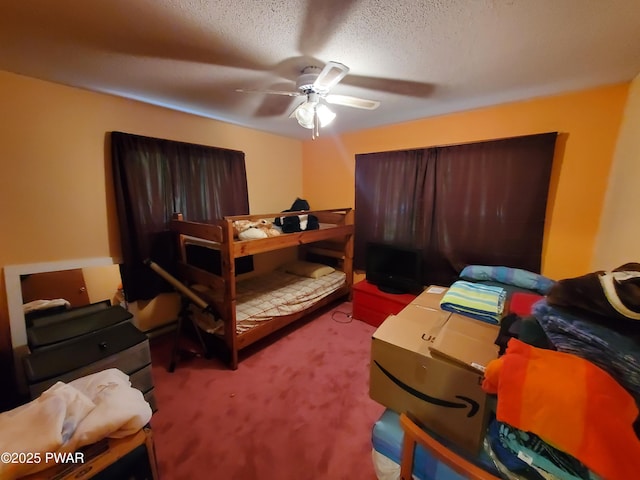 188 Forest Ridge Dr, Hawley, PA 18428 - carpeted bedroom featuring a textured ceiling and ceiling fan