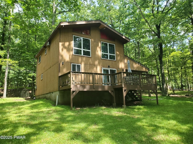 188 Forest Ridge Dr, Hawley, PA 18428 - rear view of property featuring a wooden deck and a yard
