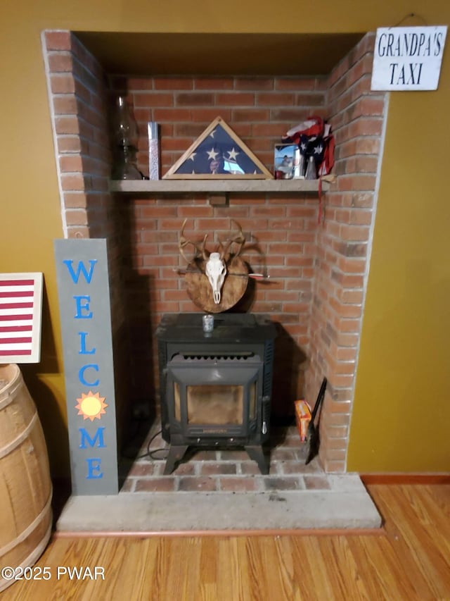 188 Forest Ridge Dr, Hawley, PA 18428 - detailed view of a wood stove and wood finished floors