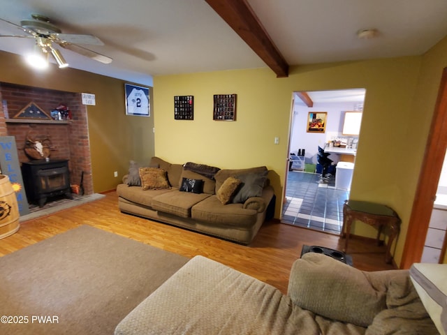 188 Forest Ridge Dr, Hawley, PA 18428 - living room featuring a ceiling fan, wood finished floors, and beamed ceiling