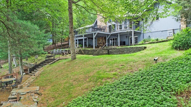 122 Waterfront Dr, Greentown, PA 18426 - view of green lawn featuring a deck and stairway