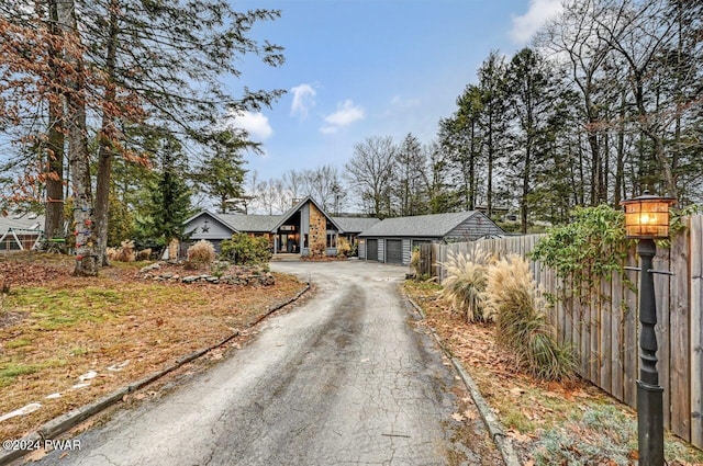 122 Waterfront Dr, Greentown, PA 18426 - view of front of home featuring asphalt driveway and an attached garage