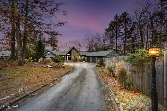 122 Waterfront Dr, Greentown, PA 18426 - view of front of home with driveway and a garage