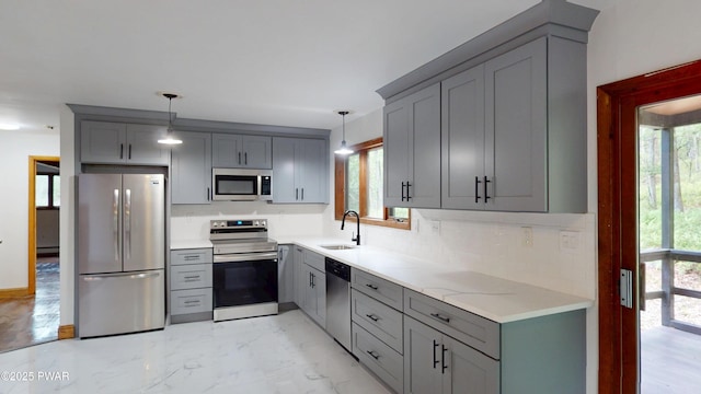158 Wild Meadow Dr, Milford, PA 18337 - kitchen featuring appliances with stainless steel finishes, gray cabinetry, and decorative backsplash