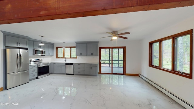 158 Wild Meadow Dr, Milford, PA 18337 - kitchen with appliances with stainless steel finishes, gray cabinets, baseboard heating, light marble finish flooring, and light countertops