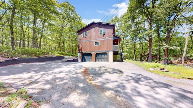 158 Wild Meadow Dr, Milford, PA 18337 - view of side of home featuring driveway and stairway