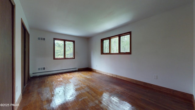 158 Wild Meadow Dr, Milford, PA 18337 - spare room featuring a baseboard radiator and hardwood / wood-style flooring