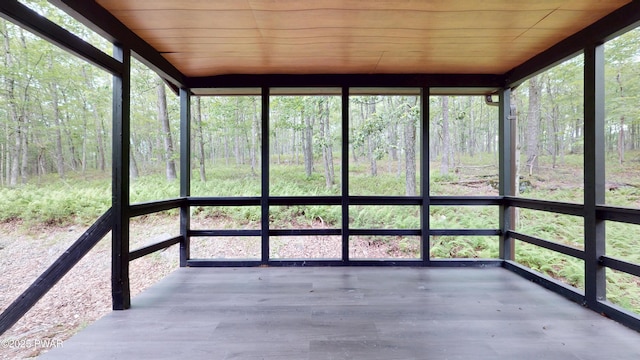158 Wild Meadow Dr, Milford, PA 18337 - unfurnished sunroom featuring a view of trees