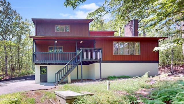 158 Wild Meadow Dr, Milford, PA 18337 - rustic home with stairs and a chimney