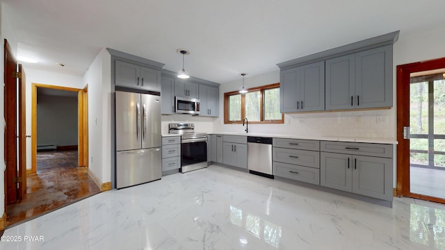 158 Wild Meadow Dr, Milford, PA 18337 - kitchen with stainless steel appliances, gray cabinets, light marble finish floors, hanging light fixtures, and light countertops