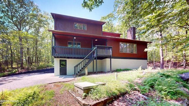 158 Wild Meadow Dr, Milford, PA 18337 - rustic home featuring stairs and a chimney
