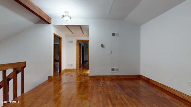 158 Wild Meadow Dr, Milford, PA 18337 - empty room with wood finished floors, attic access, and vaulted ceiling