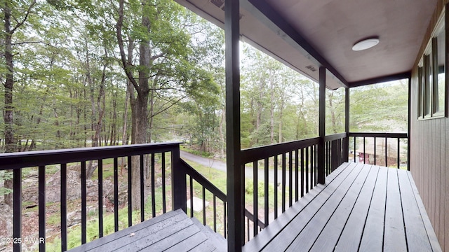 158 Wild Meadow Dr, Milford, PA 18337 - wooden terrace featuring a view of trees